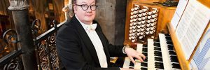 Organist David Leigh sits at the organ in Saint Patrick's Cathedral.