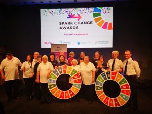 Spark Change Awards in Dublin Castle featuring members of The Iveagh Trust Community Choir supported by An Garda Síochána